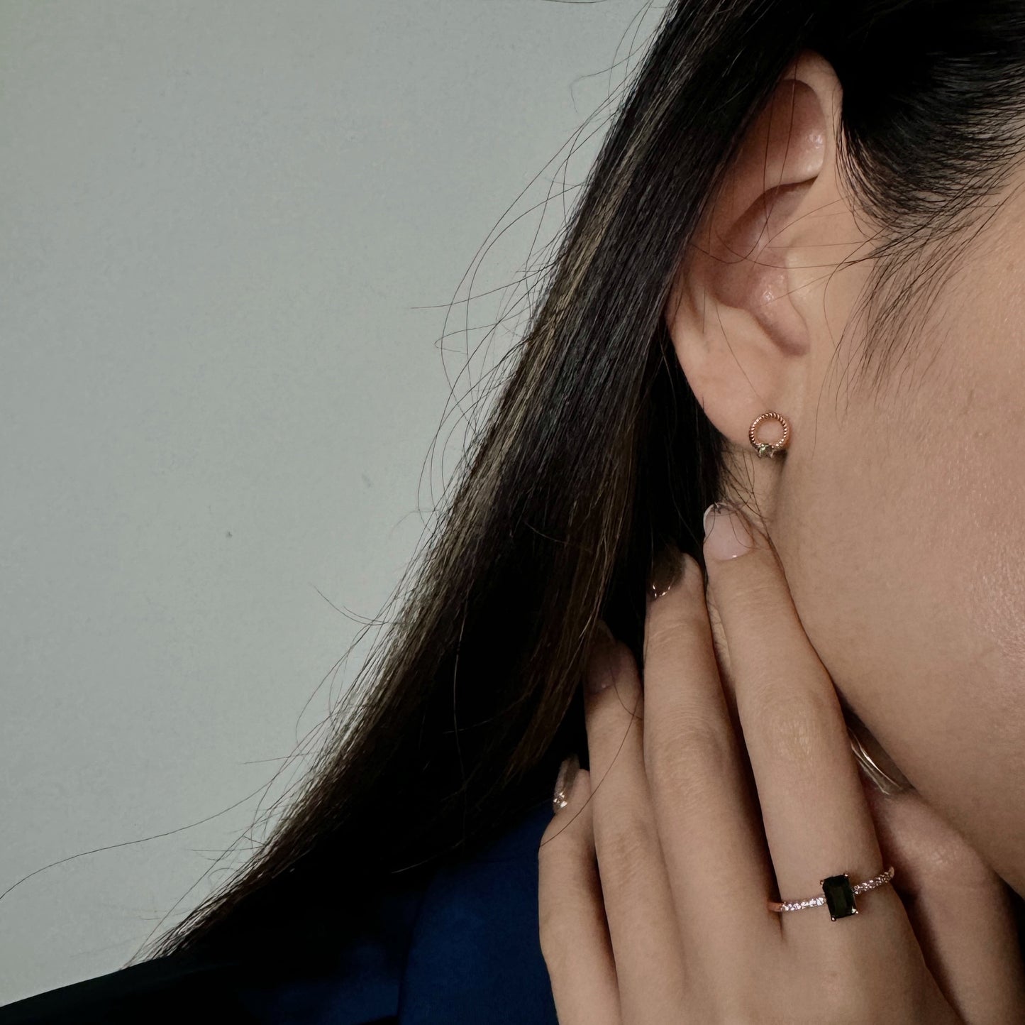 Elysian Twist Emerald Earrings